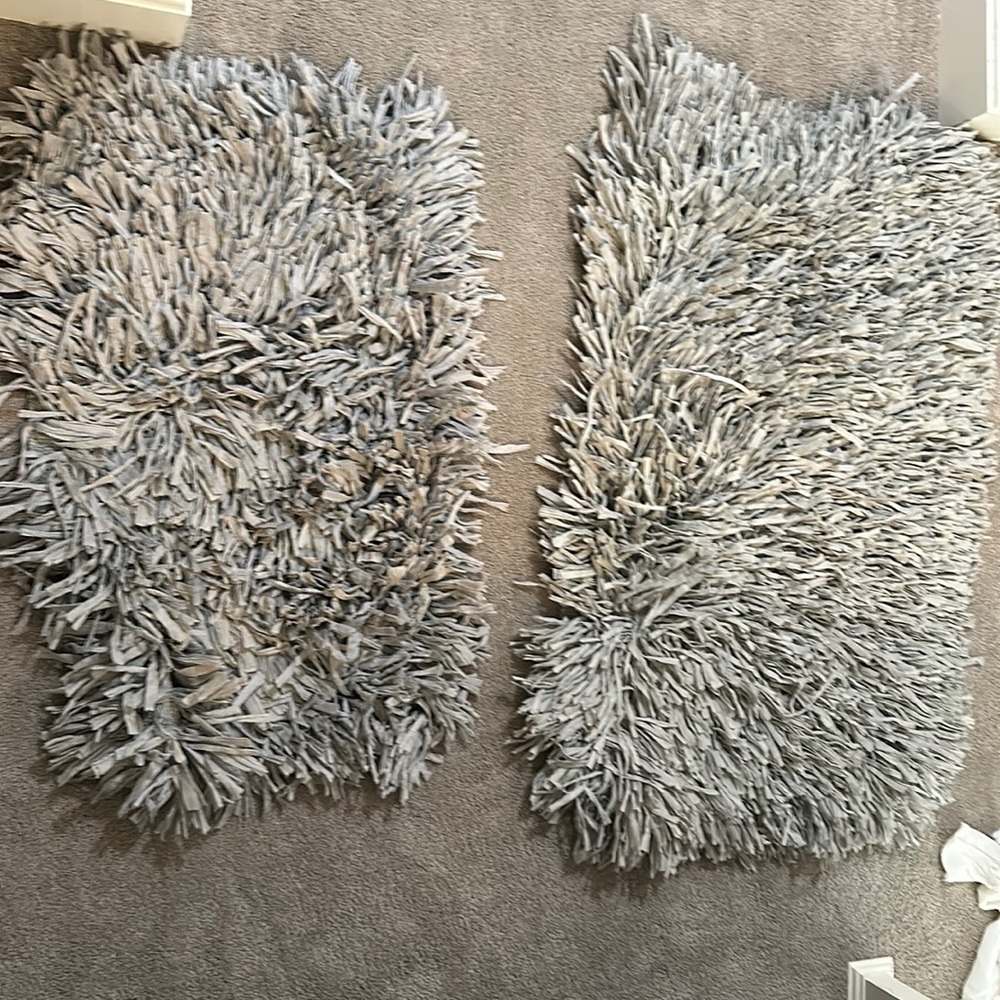 Two rugs grey one large one small